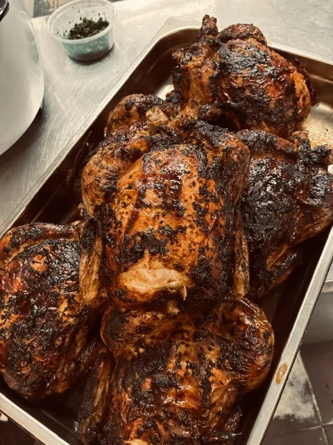 A tray of Creole roast chickens