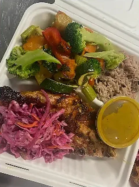 Takeaway box with chicken, roast veg, rice and slaw