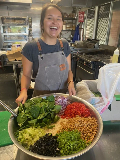 Prepping a big bowl of salad
